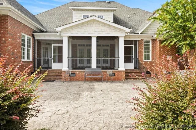 a house with trees in the background