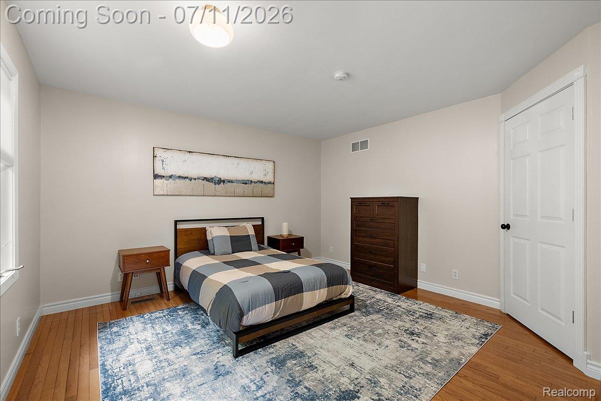 4219 Gardner Road Metamora, MI 48455 - Photo 42 of 87 Neutral-toned room featuring hardwood flooring and white trim