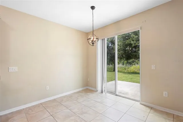 a view of a room with a large window