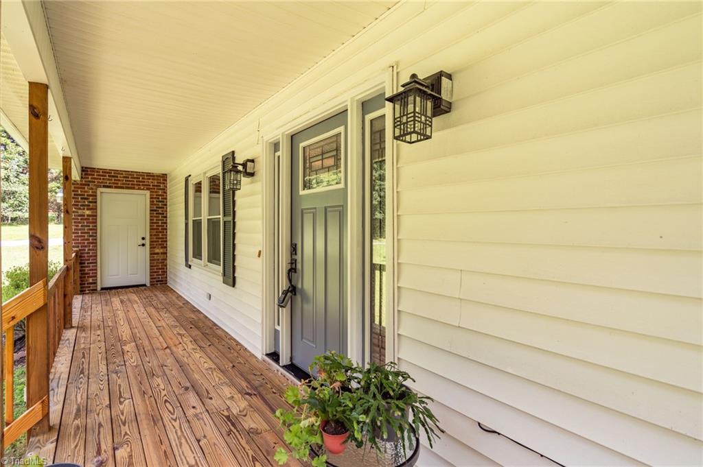 5597 Wagoner Road Trinity, NC 27370 - Photo 5 of 41 Front porch, a door from garage comes to the porch