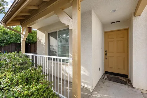 a view of a house with a small yard