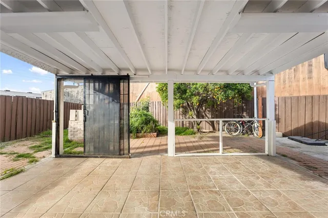 a view of an empty room with a balcony
