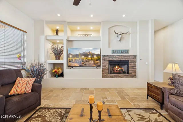 a living room with furniture and a window