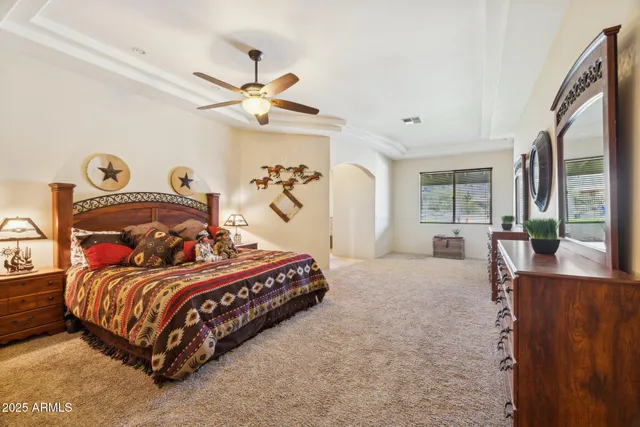 a bed room with a bed and window