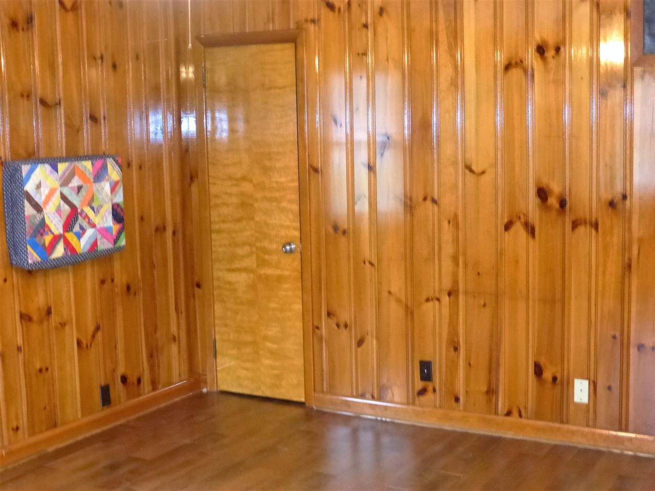 2314 Carpenter Pond Road Raleigh, NC 27613 - Photo 10 of 12 Sizable Wood Paneled Den with Hardwood Floors. Can be 3rd Bedroom. Den/Family/Great Room
