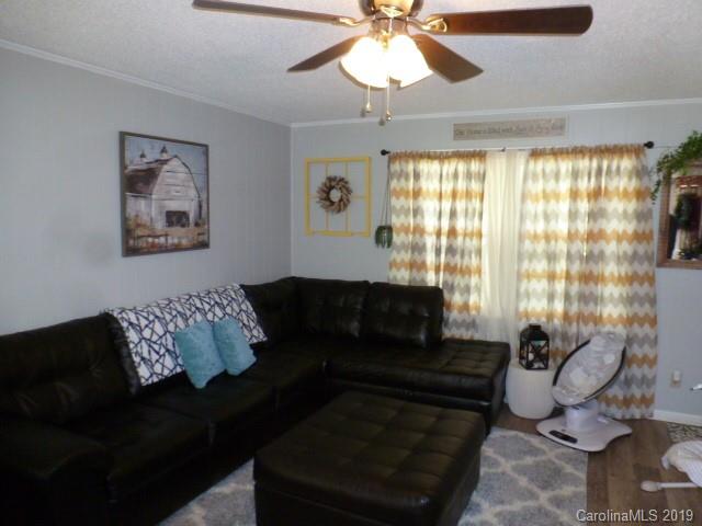 2510 State Rd S-29-305 Lancaster, SC 29720 - Photo 2 of 27 a living room with furniture and a window