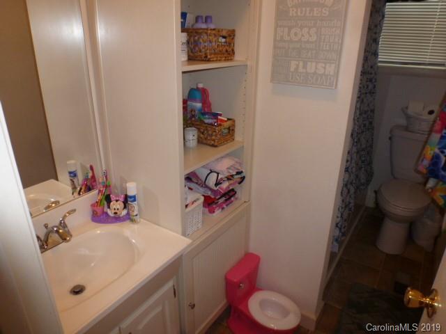 2510 State Rd S-29-305 Lancaster, SC 29720 - Photo 14 of 27 a bathroom with a sink vanity and toilet