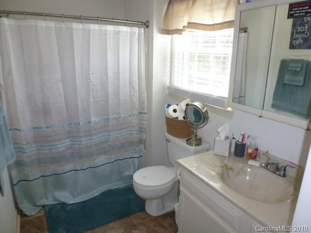 2510 State Rd S-29-305 Lancaster, SC 29720 - Photo 9 of 27 a bathroom with a sink toilet and shower