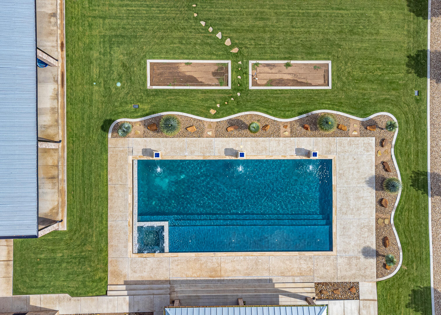 9018 County Road 6850 Lubbock, TX 79407 - Photo 11 of 103 a front view of a house with a garden