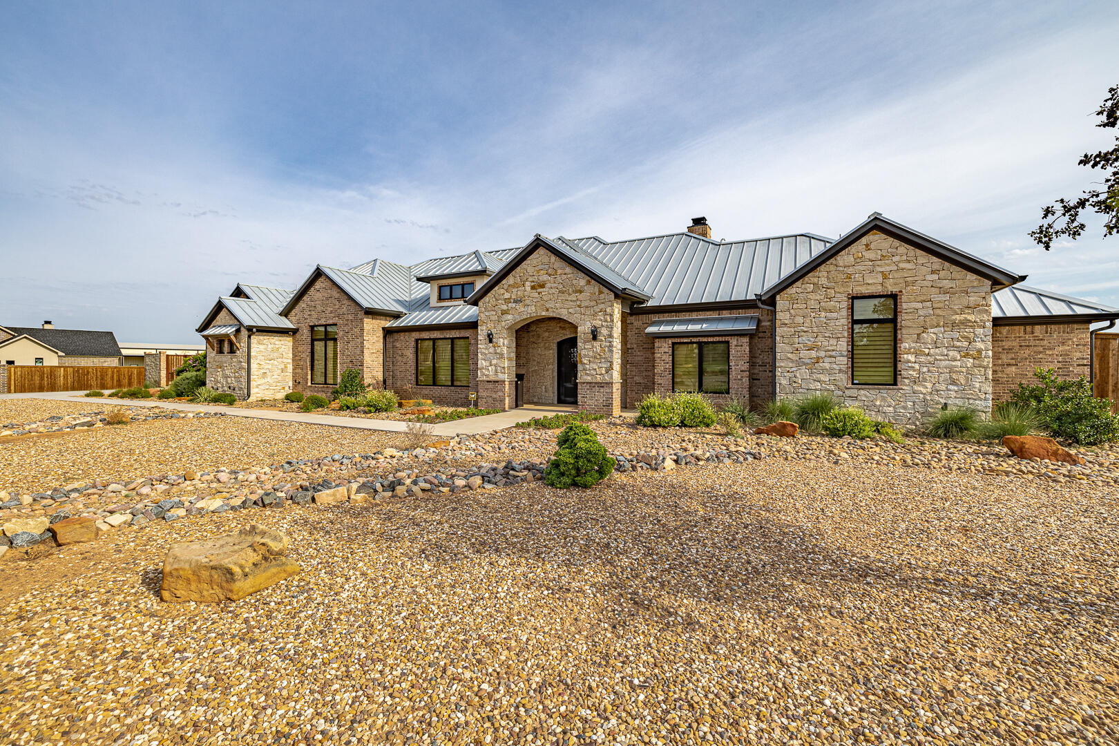9018 County Road 6850 Lubbock, TX 79407 - Photo 20 of 103 a front view of a house with a porch