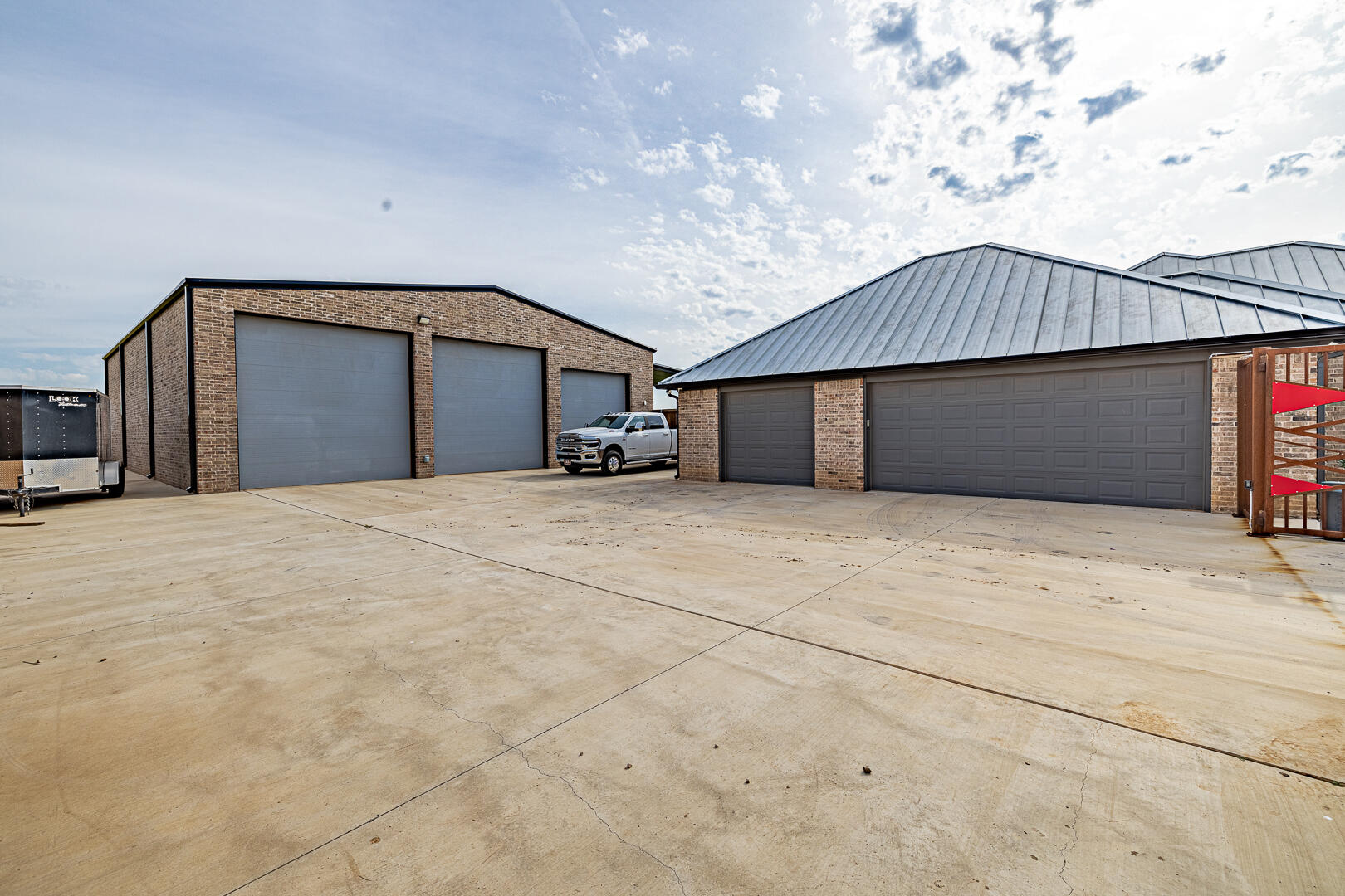 9018 County Road 6850 Lubbock, TX 79407 - Photo 31 of 103 a front view of a house with a garage