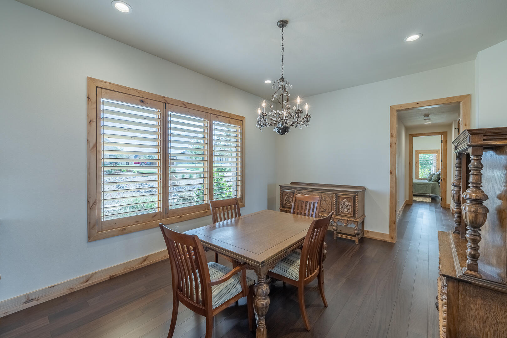 9018 County Road 6850 Lubbock, TX 79407 - Photo 40 of 103 a view of a dining room with furniture window and wooden floor