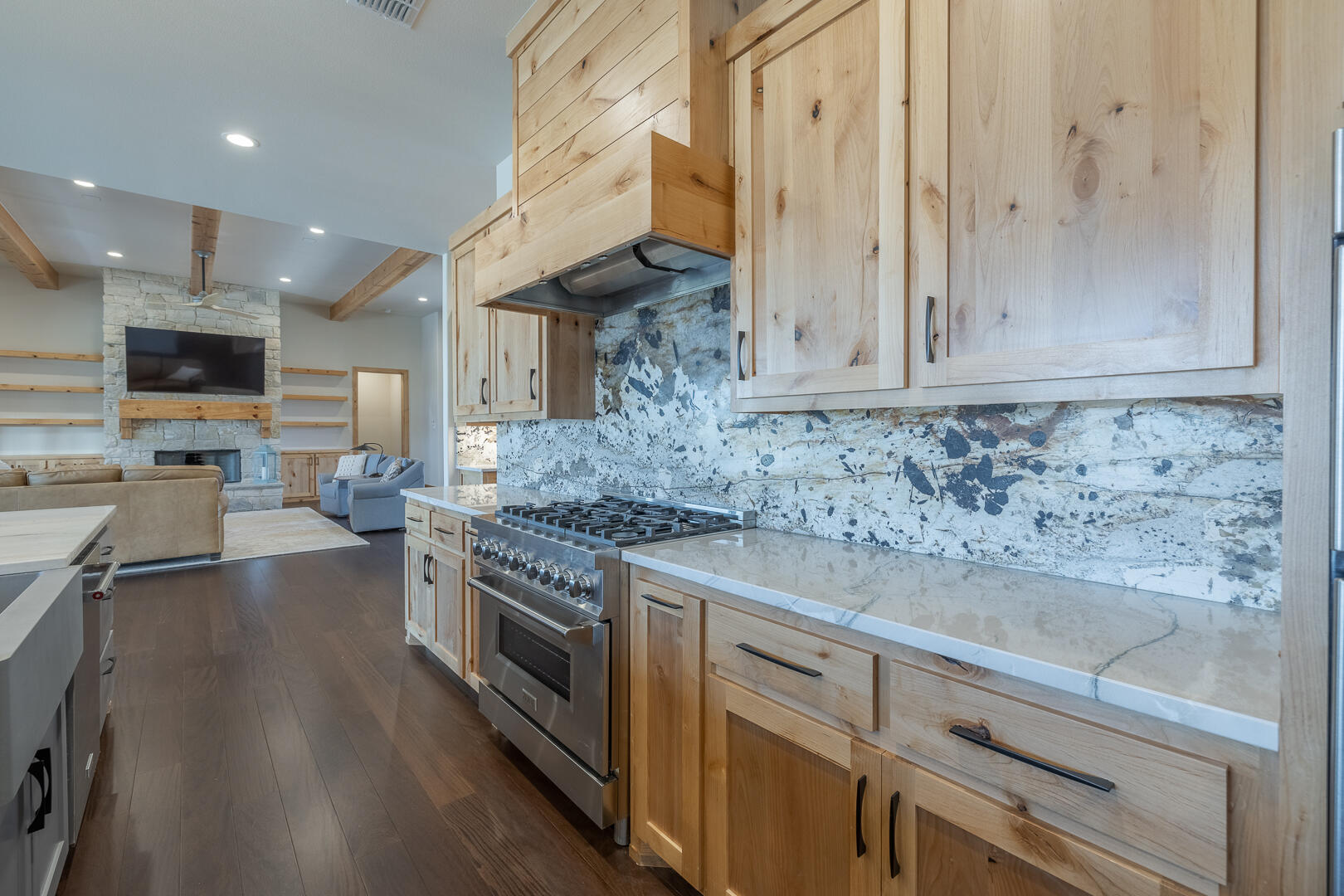 9018 County Road 6850 Lubbock, TX 79407 - Photo 54 of 103 a kitchen with stainless steel appliances granite countertop a stove and a granite counter tops