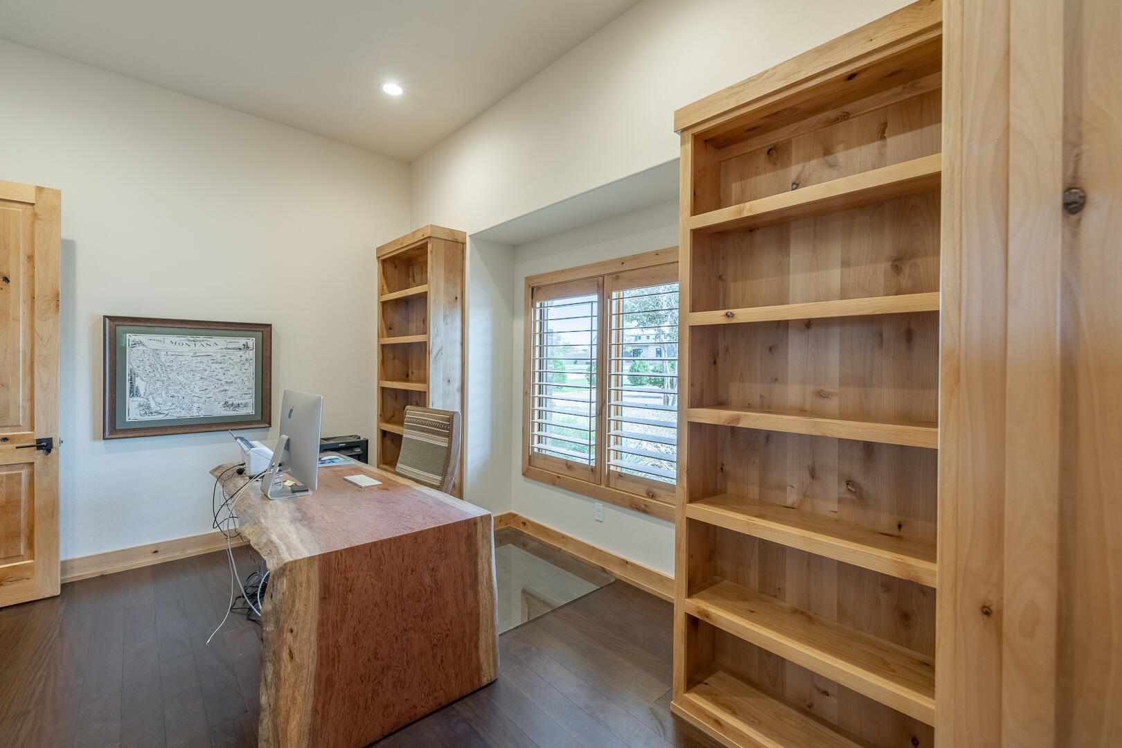 9018 County Road 6850 Lubbock, TX 79407 - Photo 57 of 103 a living room with hard wood floors and a window