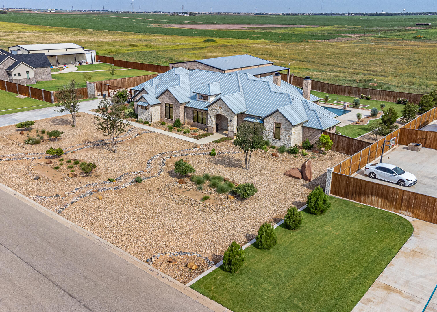 9018 County Road 6850 Lubbock, TX 79407 - Photo 6 of 103 an aerial view of a house with a ocean view