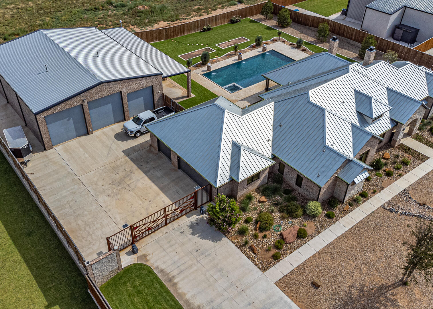 9018 County Road 6850 Lubbock, TX 79407 - Photo 7 of 103 an aerial view of a house with a garden