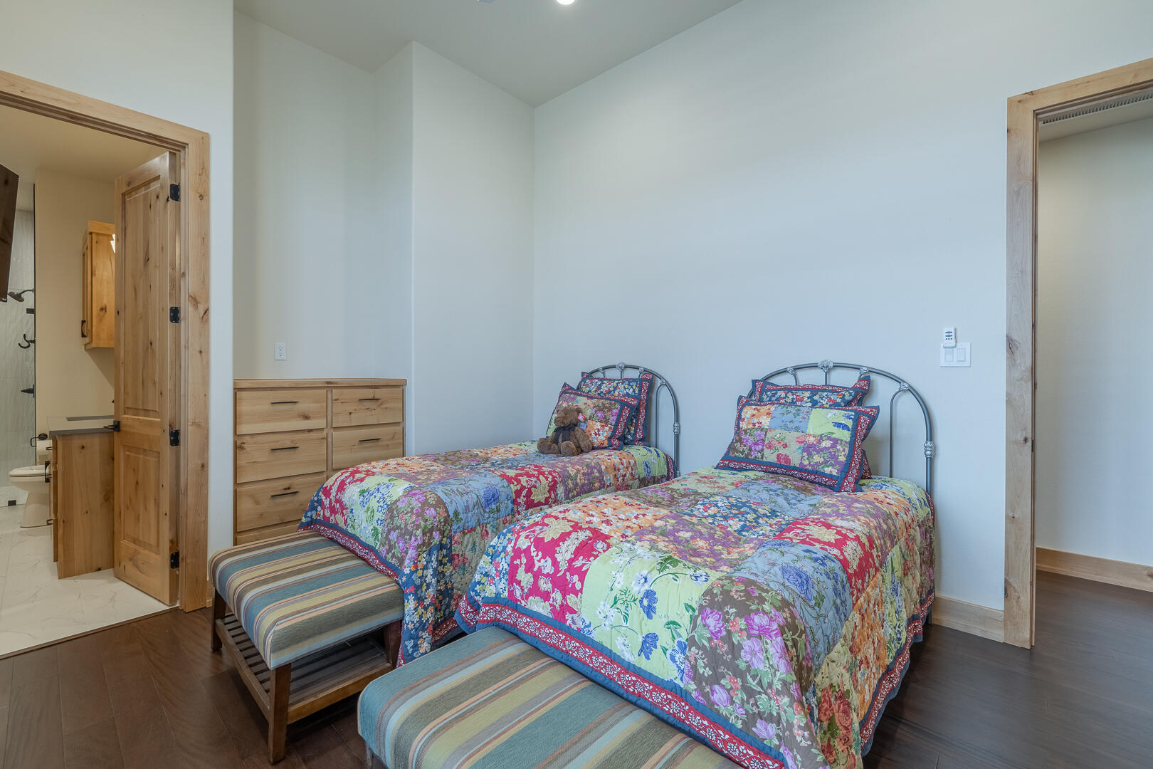 9018 County Road 6850 Lubbock, TX 79407 - Photo 71 of 103 a bedroom with two beds and painted walls