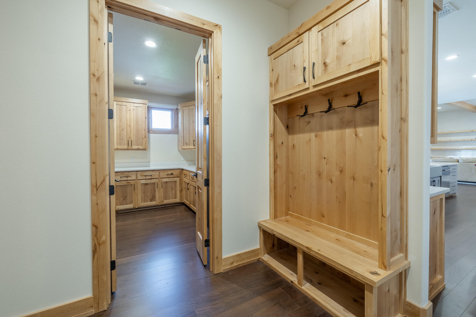 9018 County Road 6850 Lubbock, TX 79407 - Photo 80 of 103 a view of a hallway with entryway and wooden floor