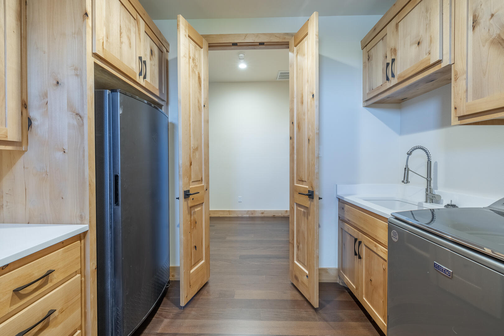 9018 County Road 6850 Lubbock, TX 79407 - Photo 84 of 103 a kitchen with stainless steel appliances granite countertop a refrigerator and a sink