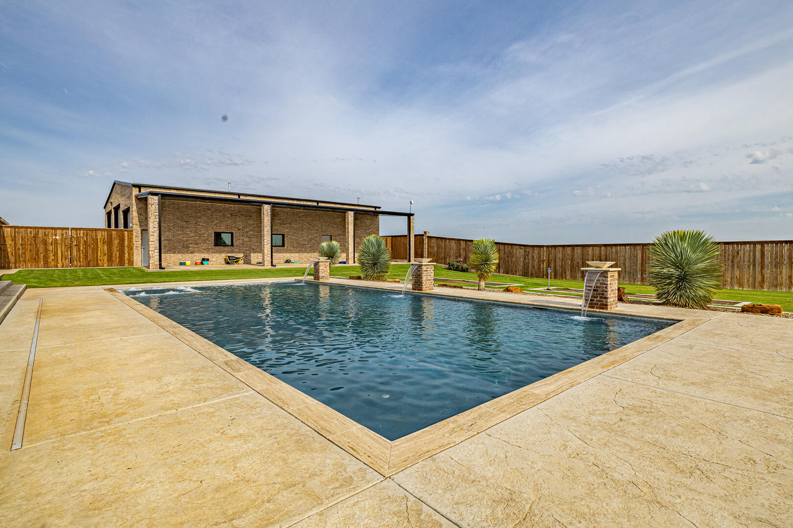 9018 County Road 6850 Lubbock, TX 79407 - Photo 92 of 103 a view of swimming pool with outdoor seating