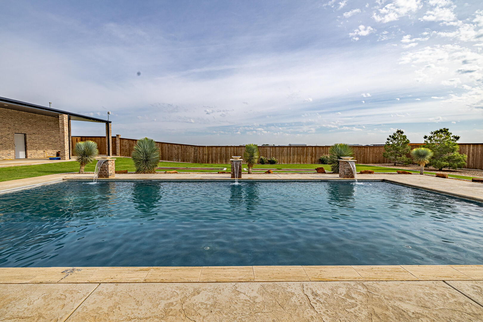 9018 County Road 6850 Lubbock, TX 79407 - Photo 93 of 103 a view of swimming pool with an outdoor seating