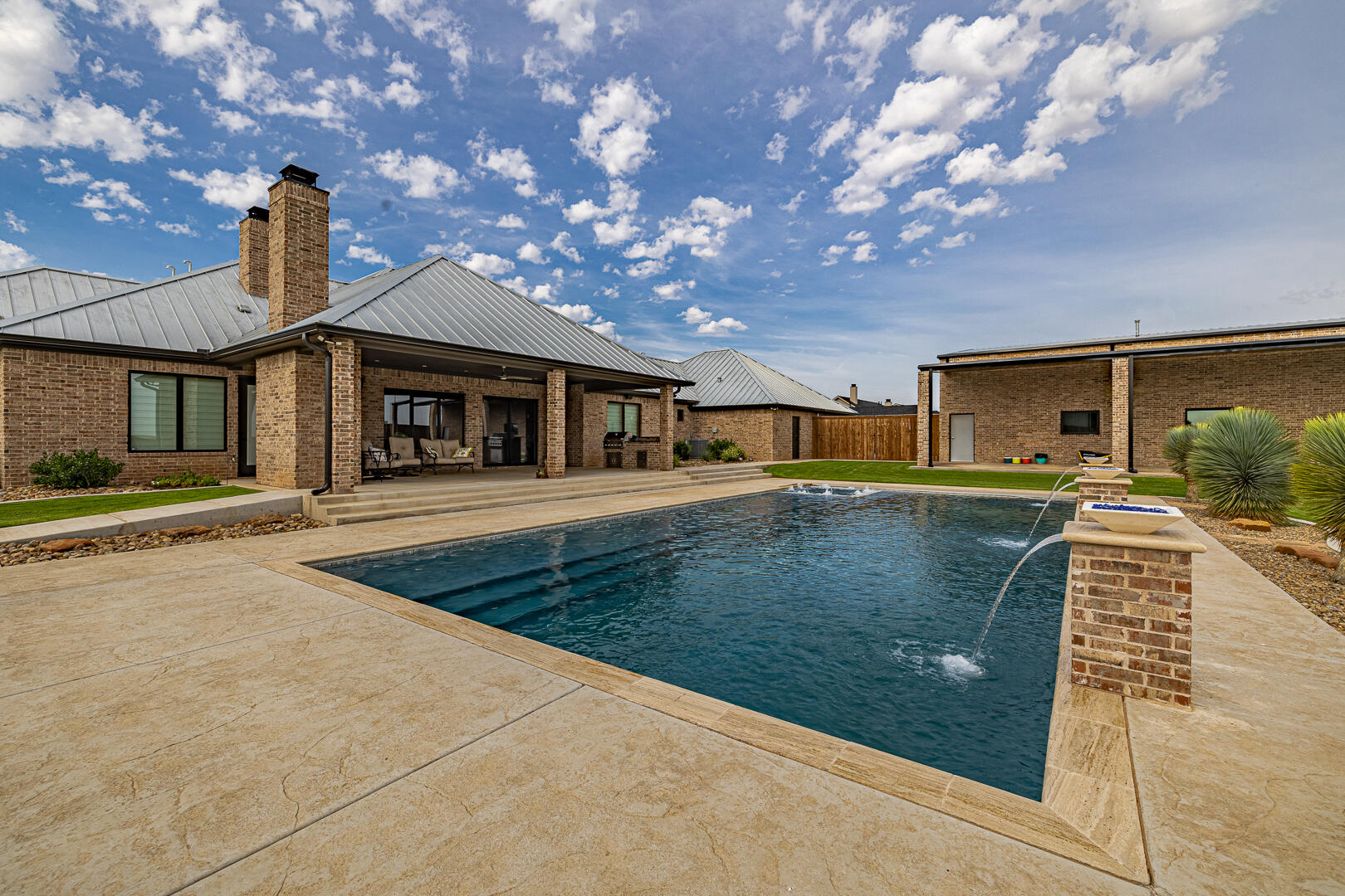 9018 County Road 6850 Lubbock, TX 79407 - Photo 97 of 103 a view of a house with a backyard