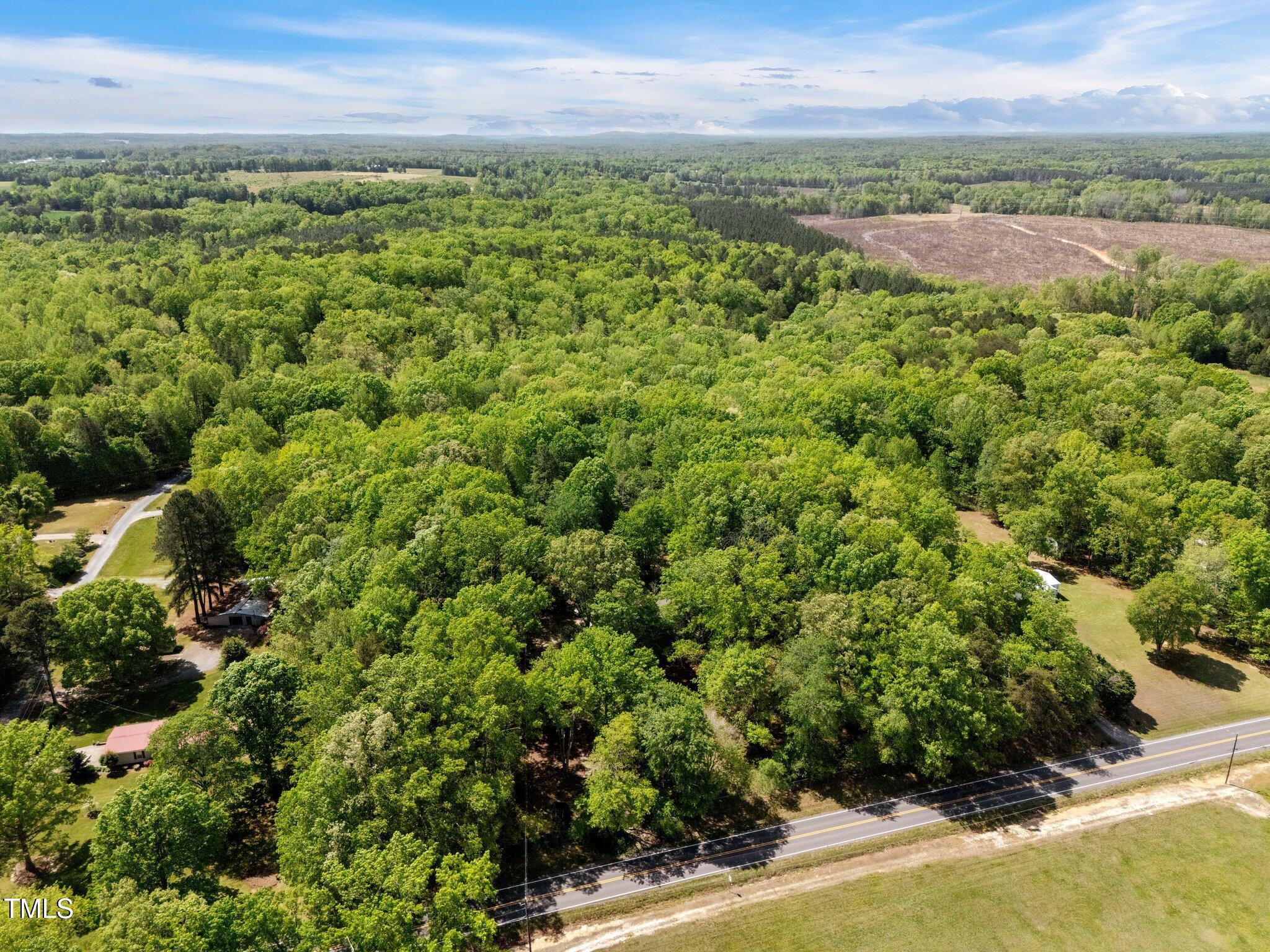 606 Dennys Store Road Roxboro, NC 27574 - Photo 1 of 16 5-web-or-mls-DJI_20250423113056_0024_D