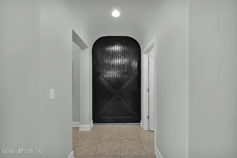 a large kitchen with granite countertop lots of counter top space