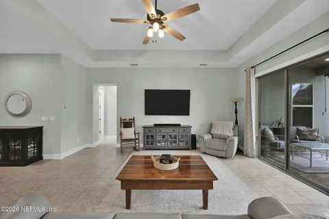 a swimming pool with outdoor seating yard and barbeque oven