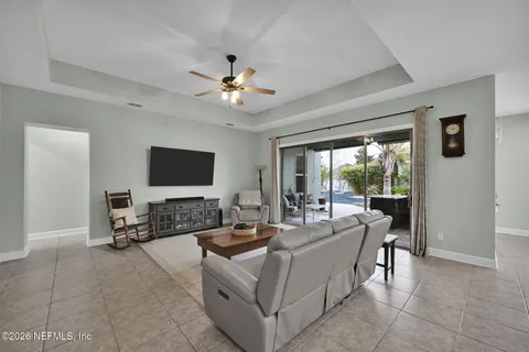 a view of a patio with swimming pool table and chairs