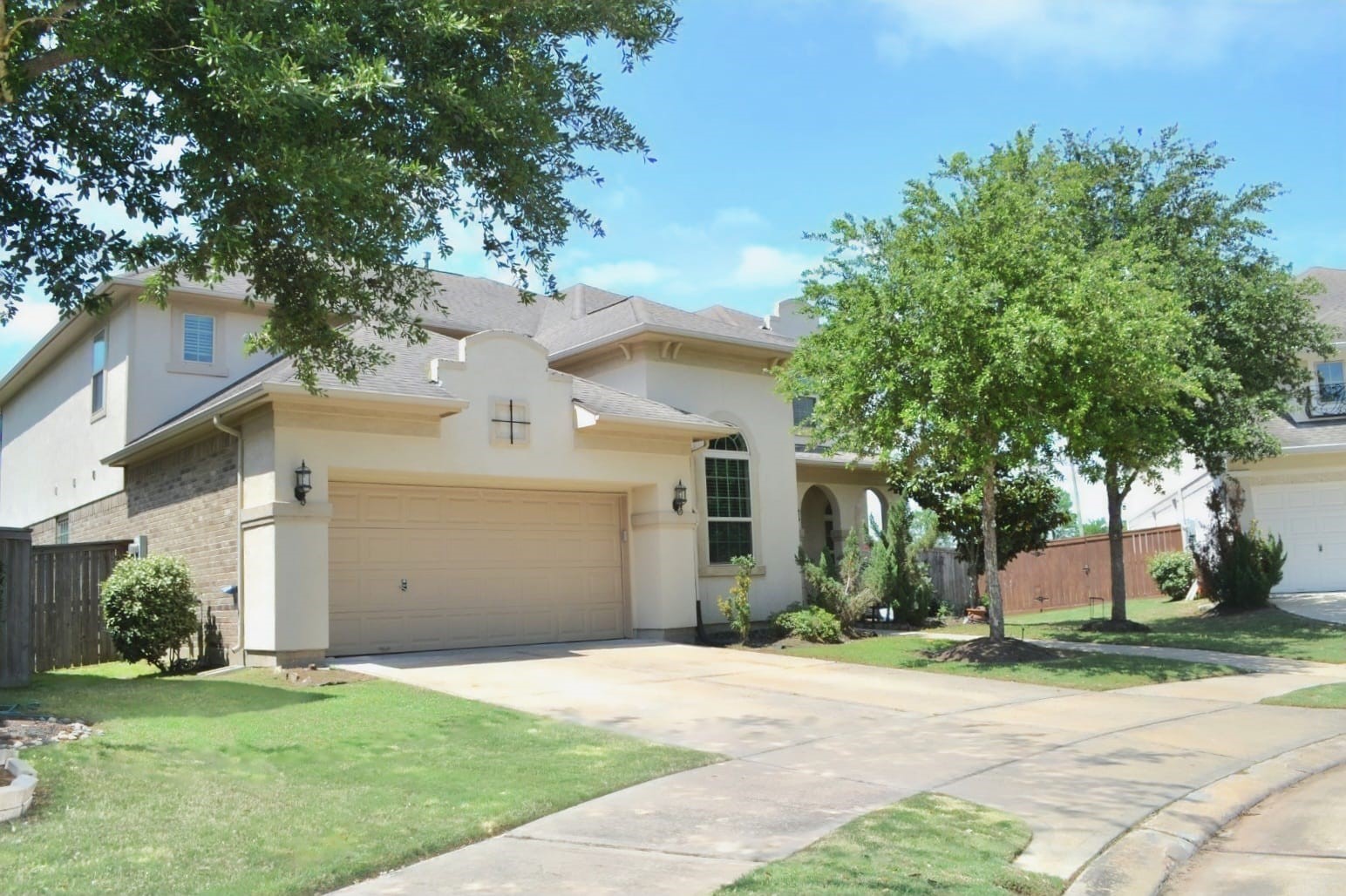 5206 Jacob Ridge Court Sugar Land, TX 77479 - Photo 1 of 42 a front view of a house with a yard and garage