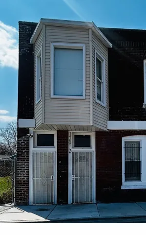 a bedroom with furniture and a chandelier