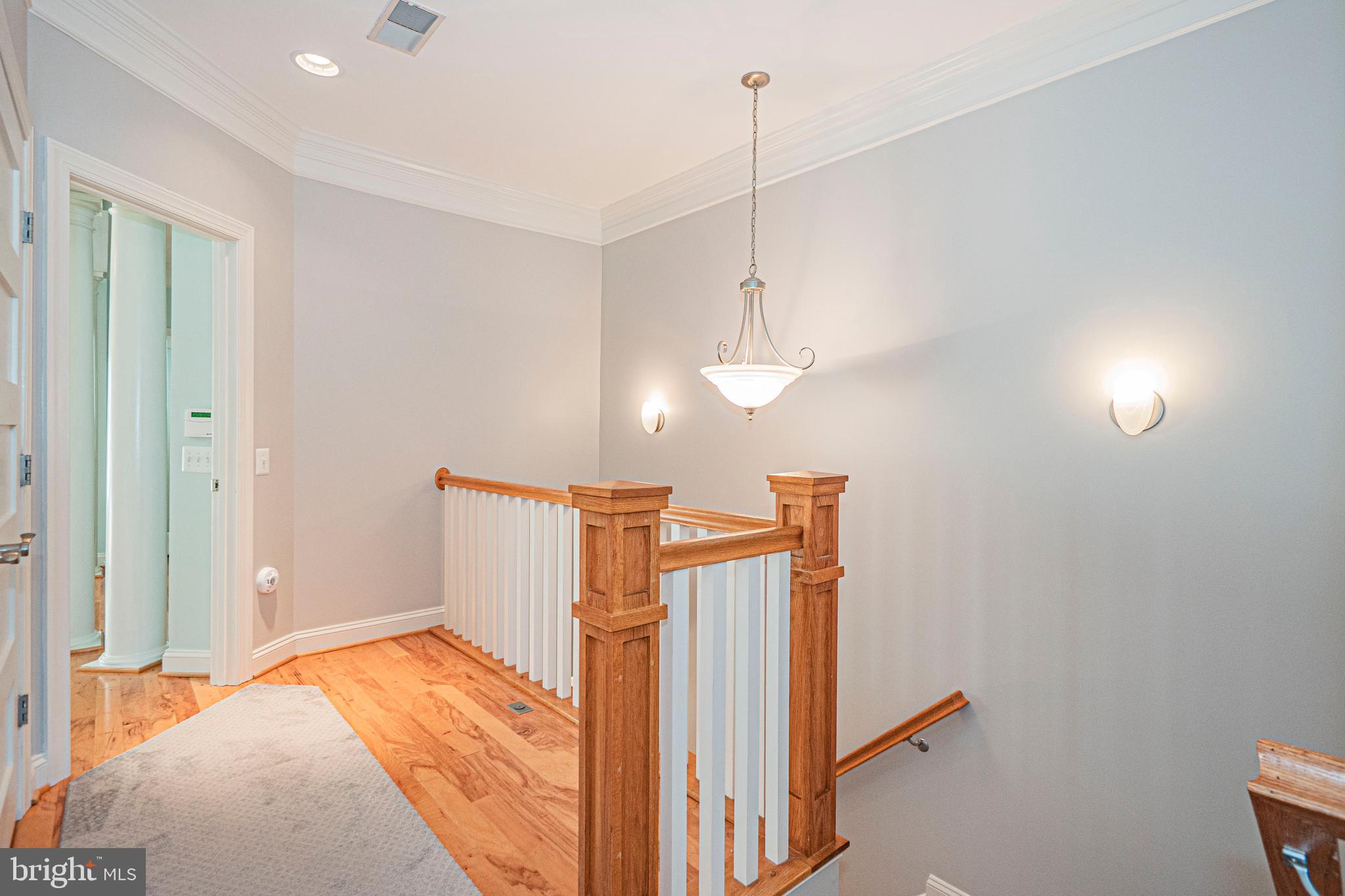 5448 Edsall Ridge Place Alexandria, VA 22312 - Photo 19 of 52 a view of a bedroom with bed and window