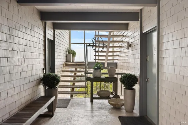a view of a porch with a bench