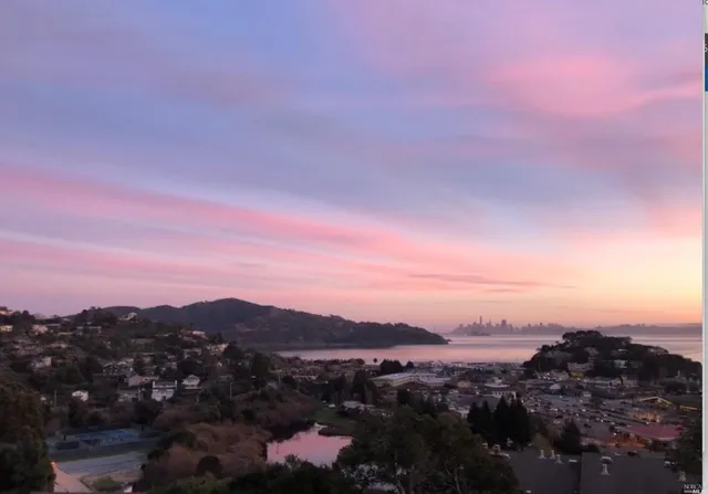 a view of city and mountain
