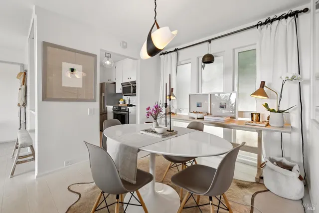 a view of a dining room with furniture