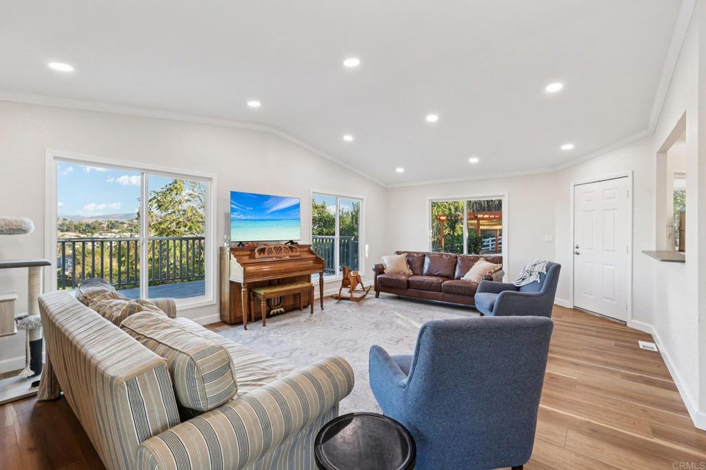 8735 Almond Road Lakeside, CA 92040 - Photo 13 of 71 a living room with furniture and a wooden floor