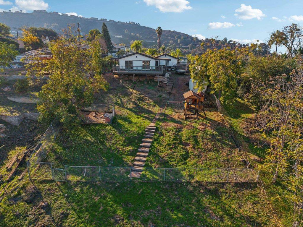 8735 Almond Road Lakeside, CA 92040 - Photo 56 of 71 a view of a lake with a building in the background