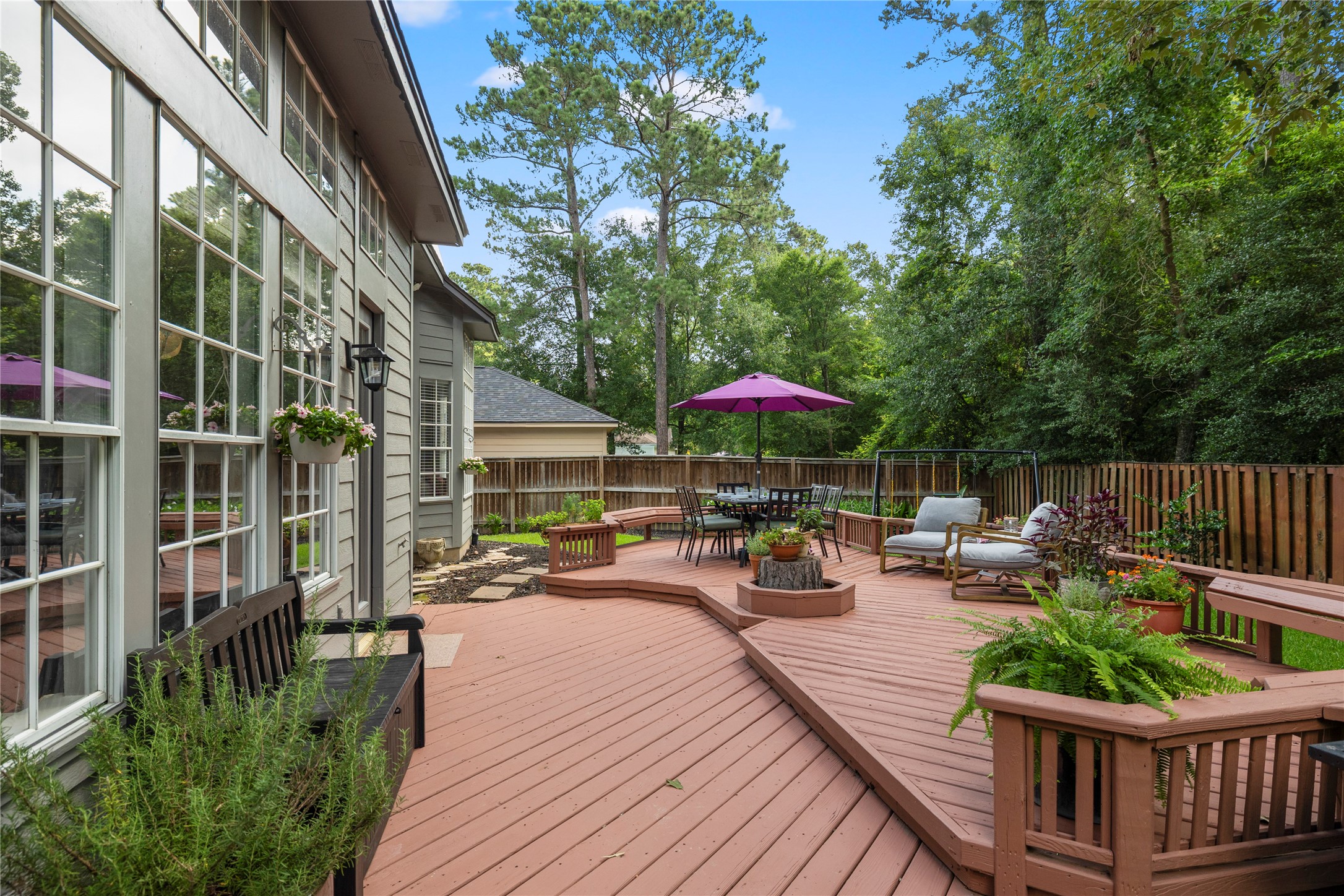 102 Treescape Circle Spring, TX 77381 - Photo 25 of 40 Plentiful outdoor seating, with no rear neighbors in sight creating a perfect setting for relaxation and entertaining.