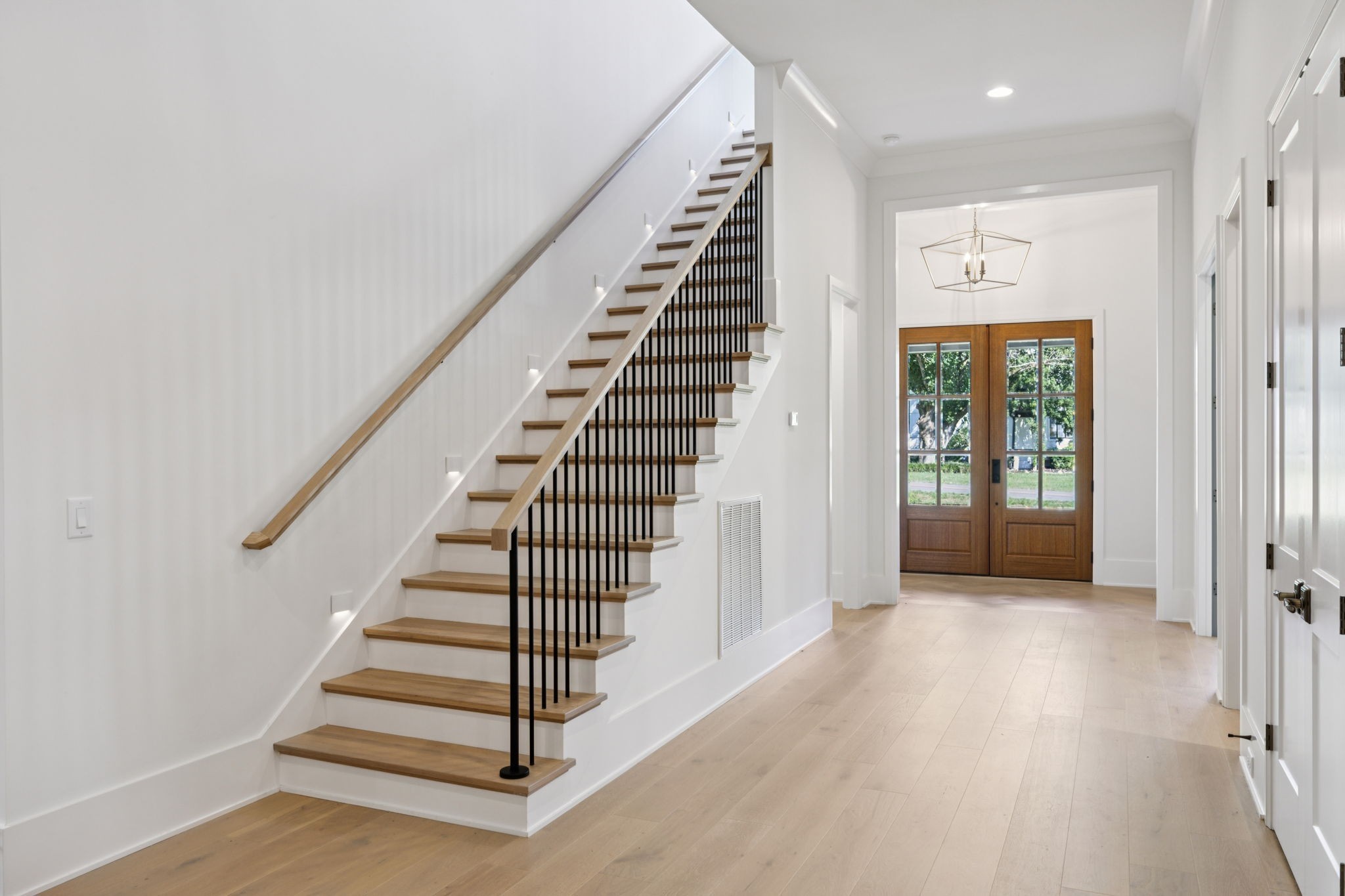 1408 Adams Street Franklin, TN 37064 - Photo 11 of 74 a view of entryway with wooden floor