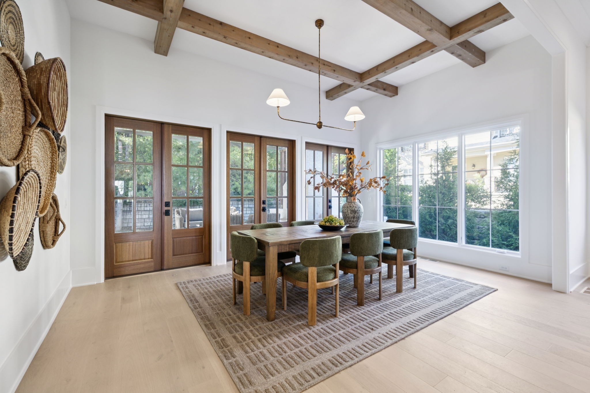 1408 Adams Street Franklin, TN 37064 - Photo 21 of 74 a dining room with furniture a chandelier and a rug