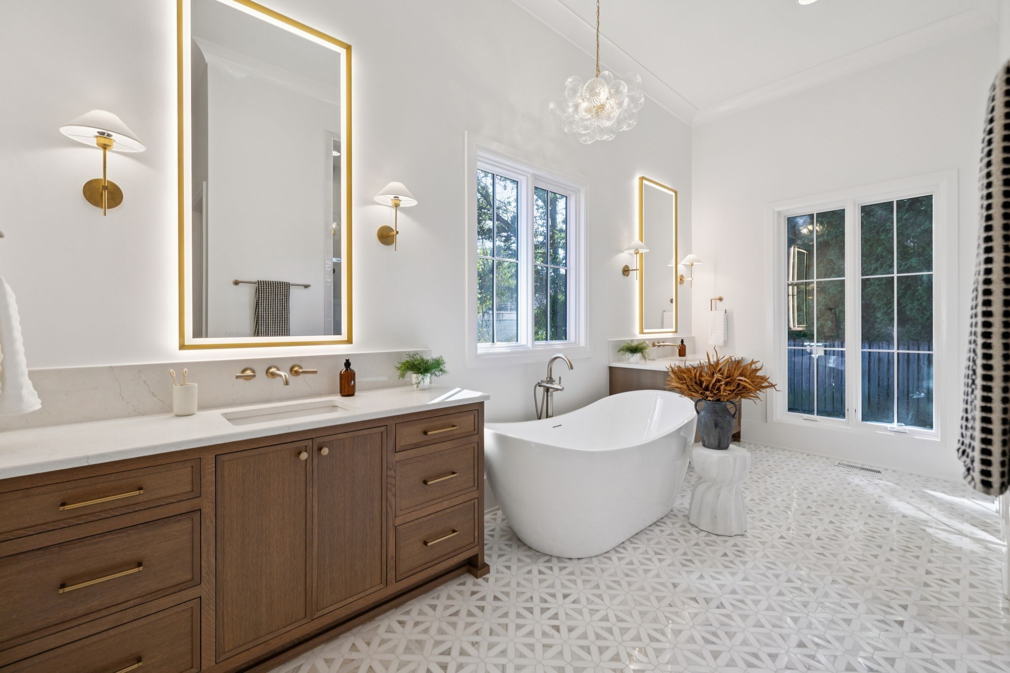 1408 Adams Street Franklin, TN 37064 - Photo 46 of 74 a spacious bathroom with a double vanity sink a mirror and a bathtub