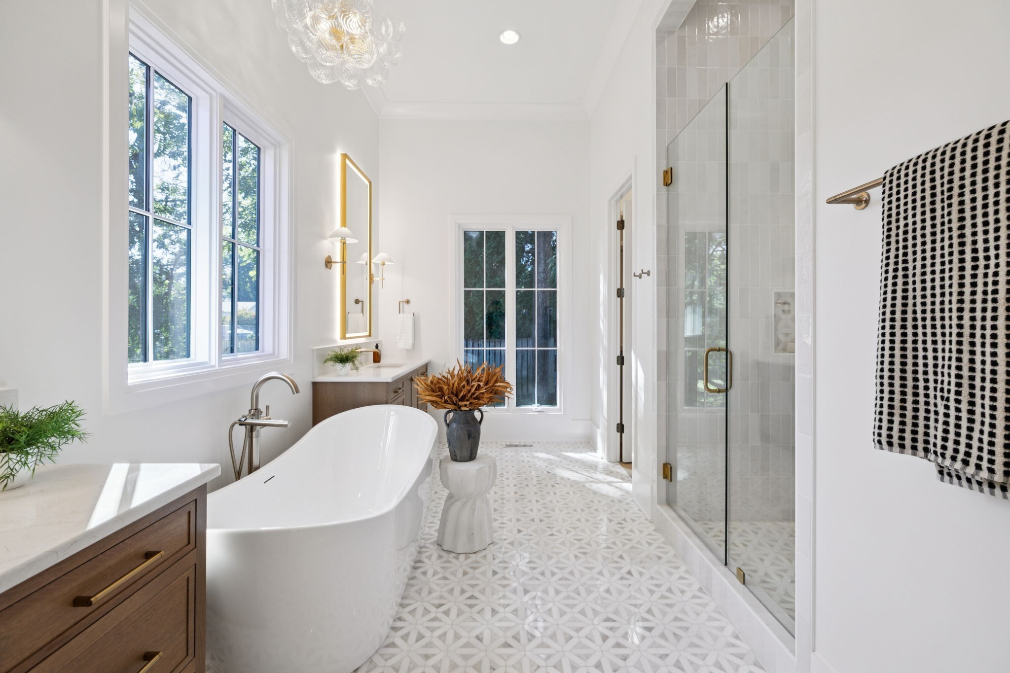 1408 Adams Street Franklin, TN 37064 - Photo 47 of 74 a spacious bathroom with a tub sink shower and mirror