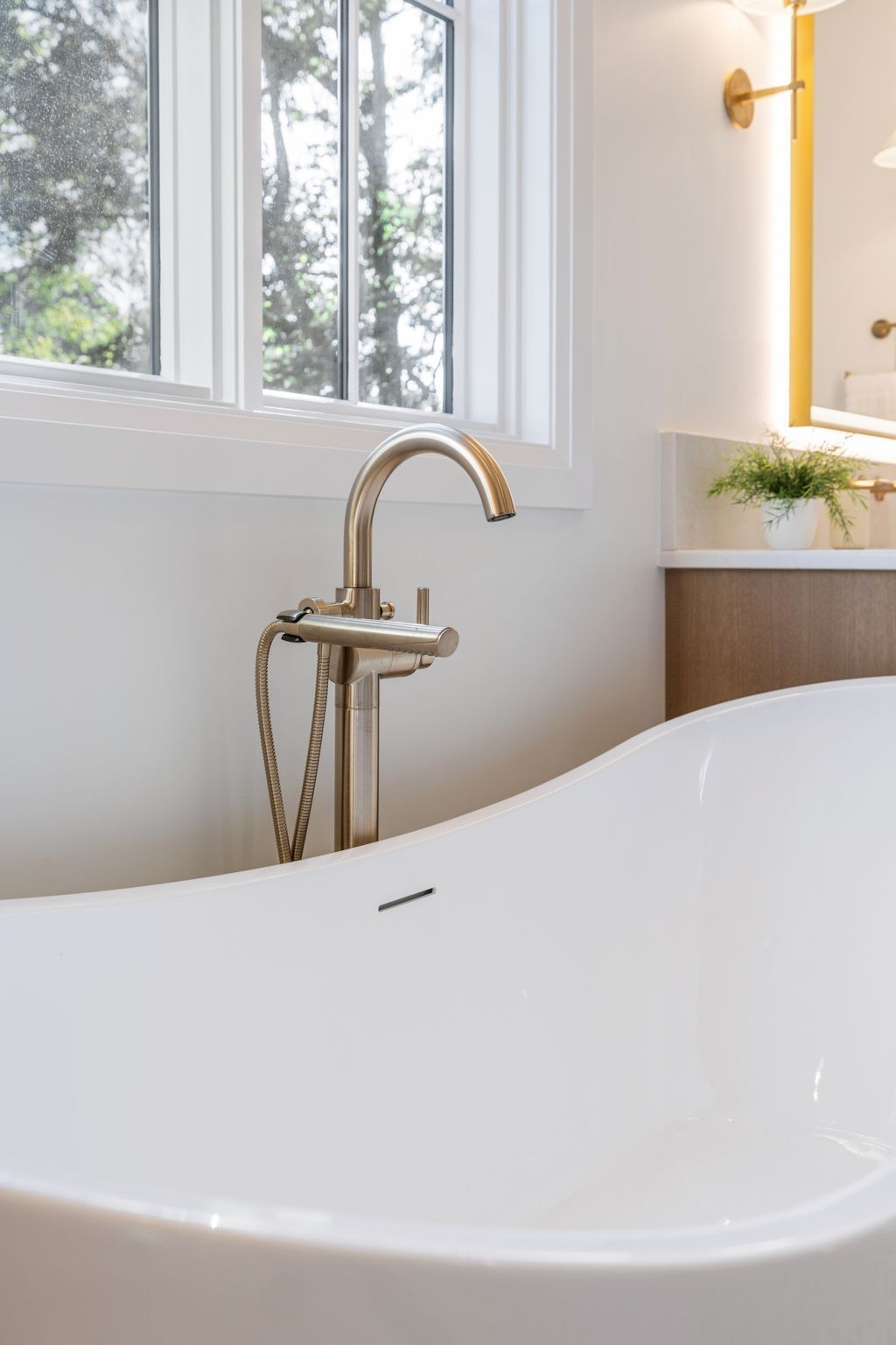 1408 Adams Street Franklin, TN 37064 - Photo 49 of 74 a white bath tub sitting in a bathroom next to a window