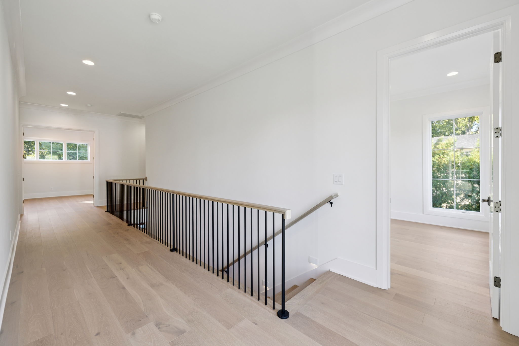 1408 Adams Street Franklin, TN 37064 - Photo 55 of 74 a view of a hallway with window and stairs
