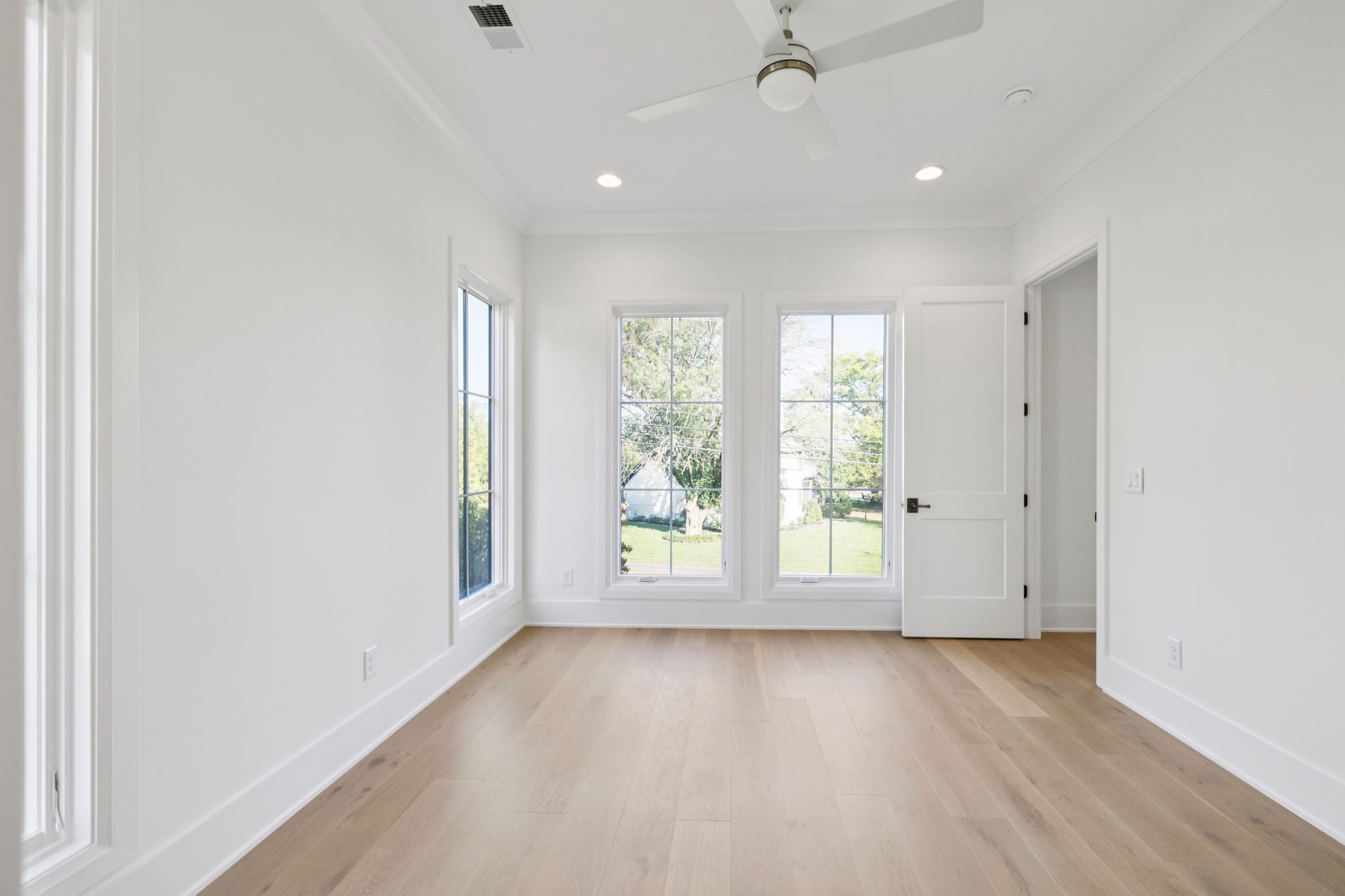 1408 Adams Street Franklin, TN 37064 - Photo 57 of 74 an empty room with wooden floor and windows