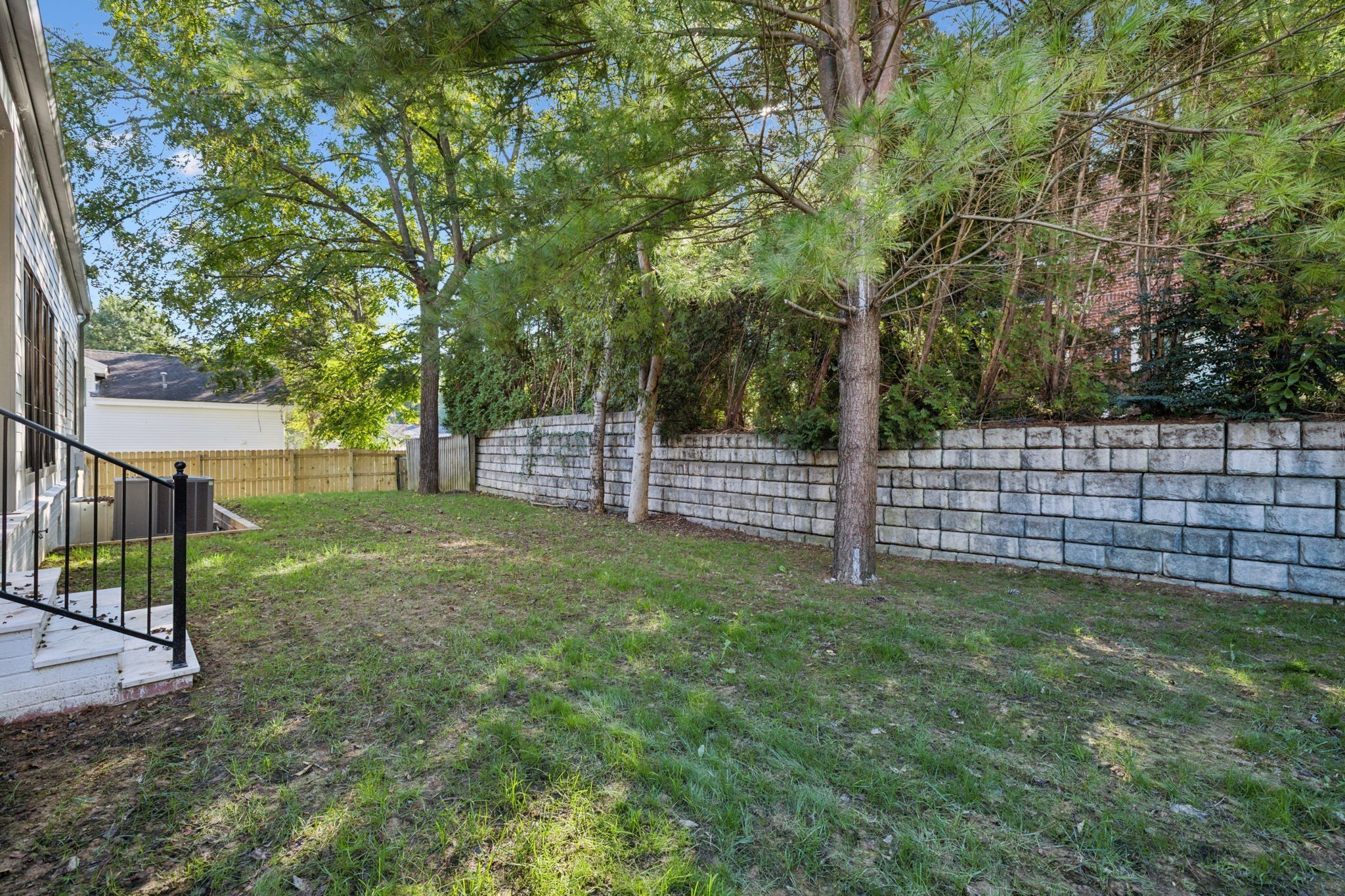 1408 Adams Street Franklin, TN 37064 - Photo 70 of 74 a view of a yard with wooden fence