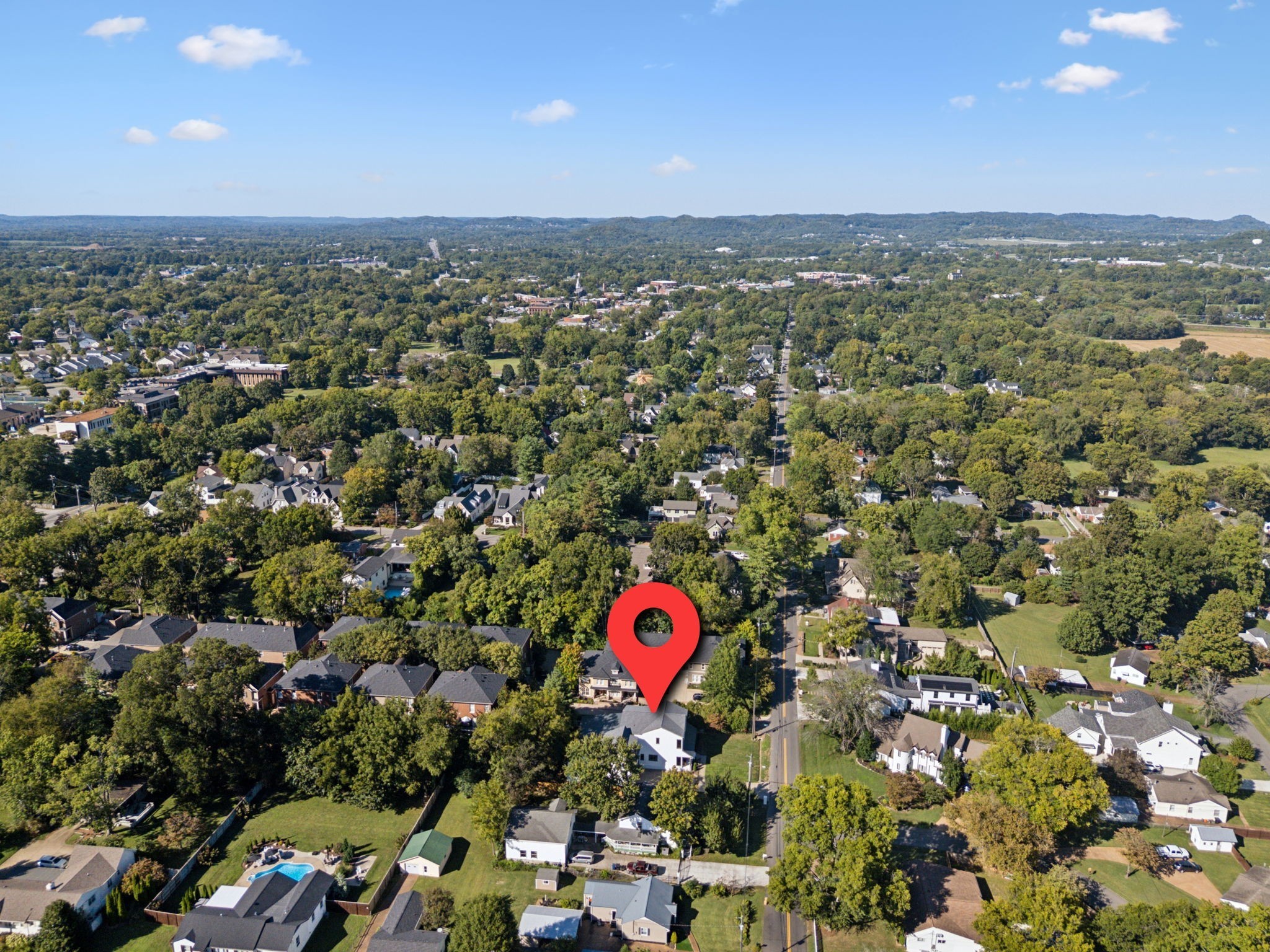 1408 Adams Street Franklin, TN 37064 - Photo 71 of 74 an aerial view of a residential houses with city view