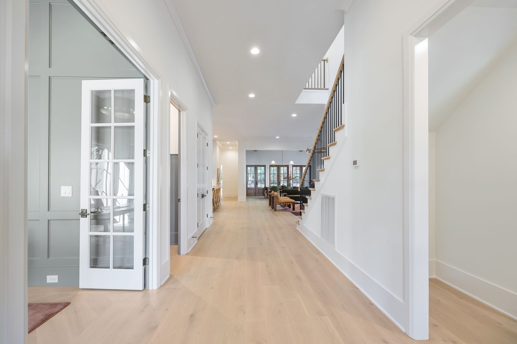 1408 Adams Street Franklin, TN 37064 - Photo 10 of 74 a view of a hallway with wooden floor and a living room
