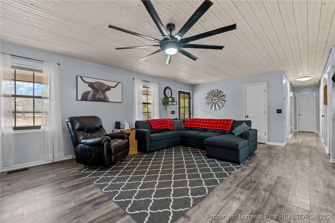 2229 Tingen Road Lillington, NC 27546 - Photo 11 of 50 a living room with furniture and a window